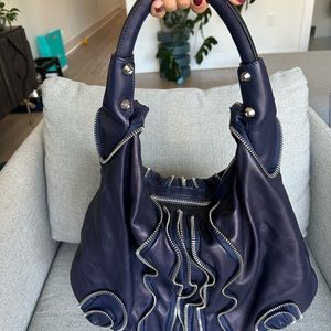 Zipper embellished leather hobo handbag Stuart Weitzman